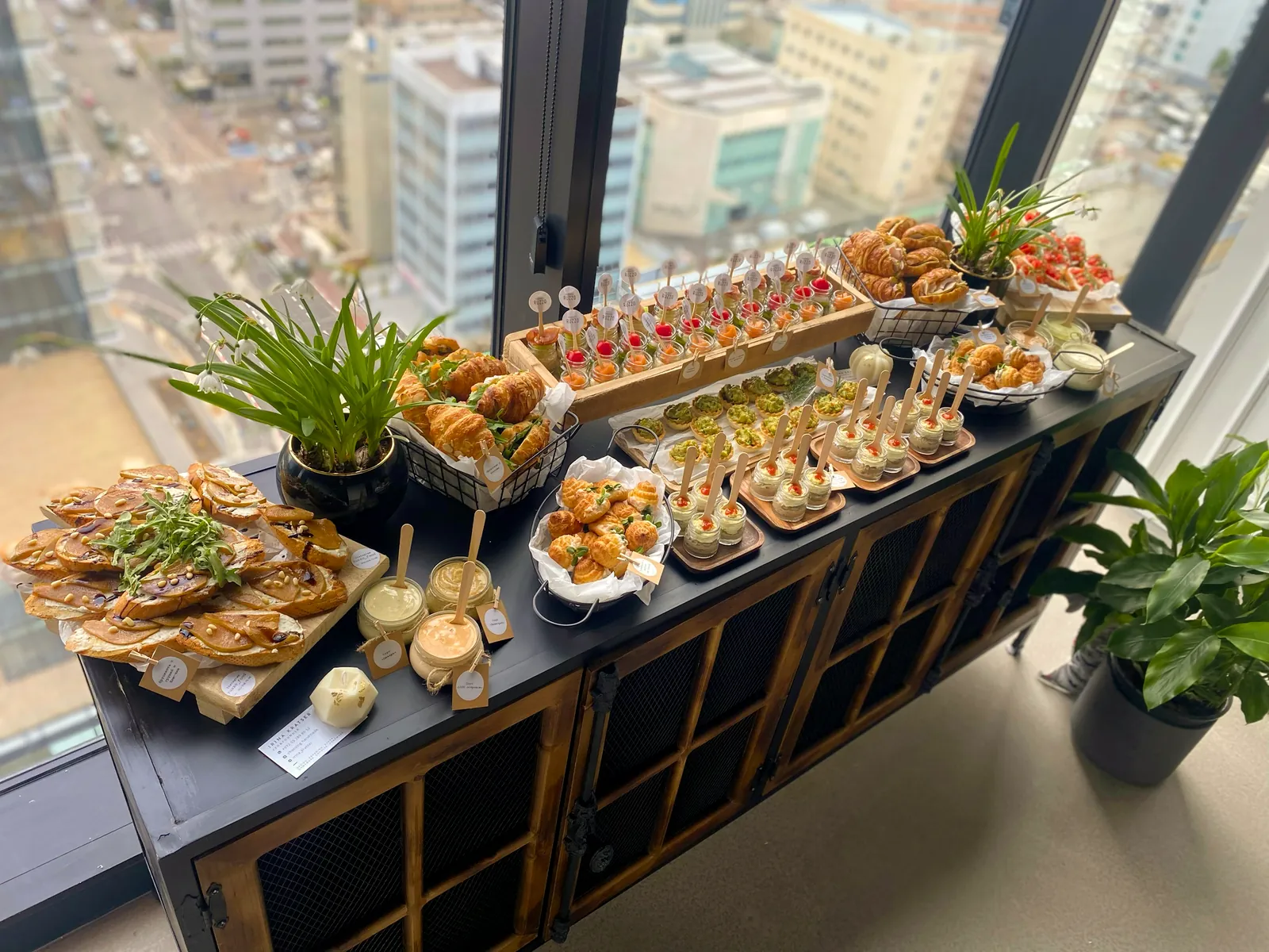 A delegate buffet of canapes and small plates in a high-rise venue